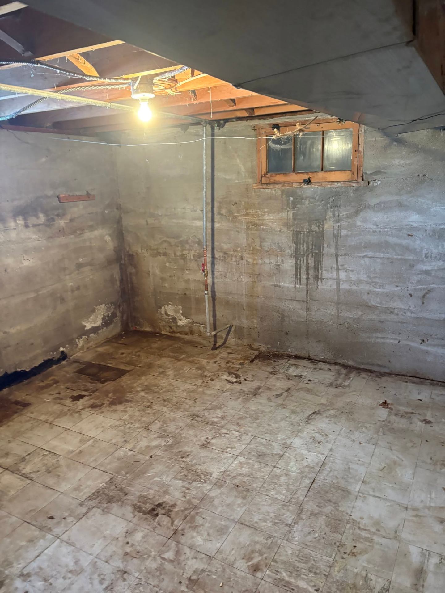 Empty, swept-clean Maryland basement after Apex Junk Removal hauled everything away