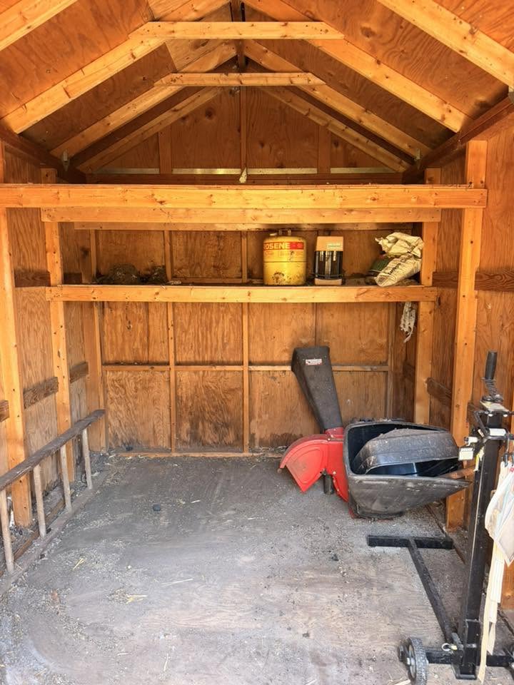 Same Maryland shed completely cleared out with only a few items remaining after Apex Junk Removal